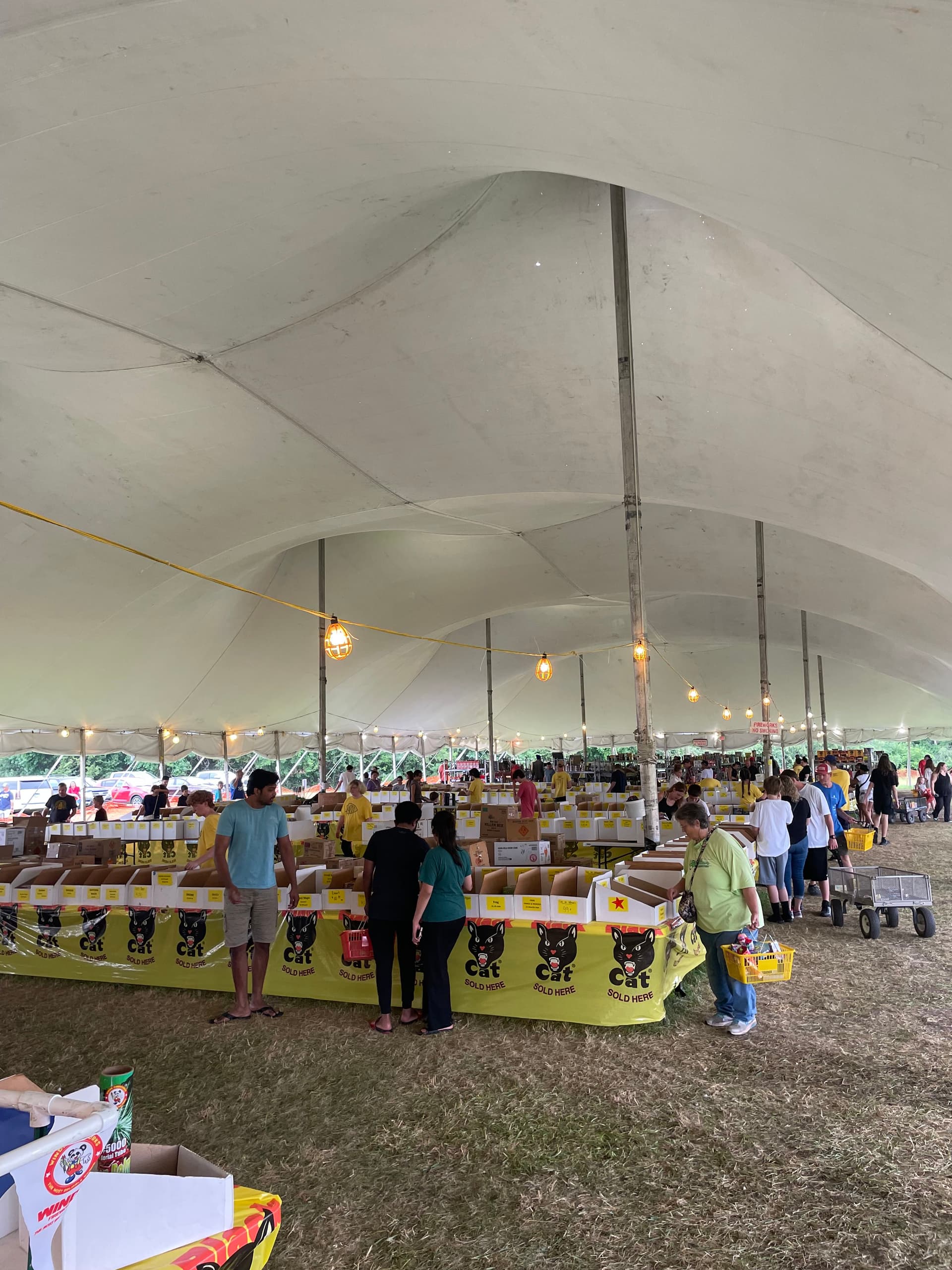 Crazy Joe's Fireworks shoppers browsing the 200-foot aisle at 171st and Holmes in Kansas City